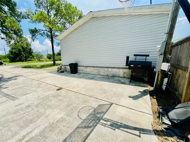 a view of backyard and entertaining space