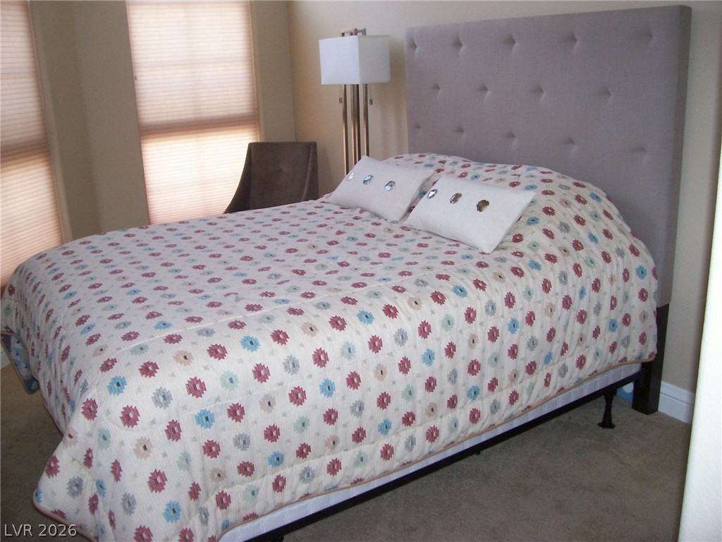 6 Via Vasari, Unit 104 Henderson, NV 89011 - Photo 11 of 13 Bedroom featuring carpet