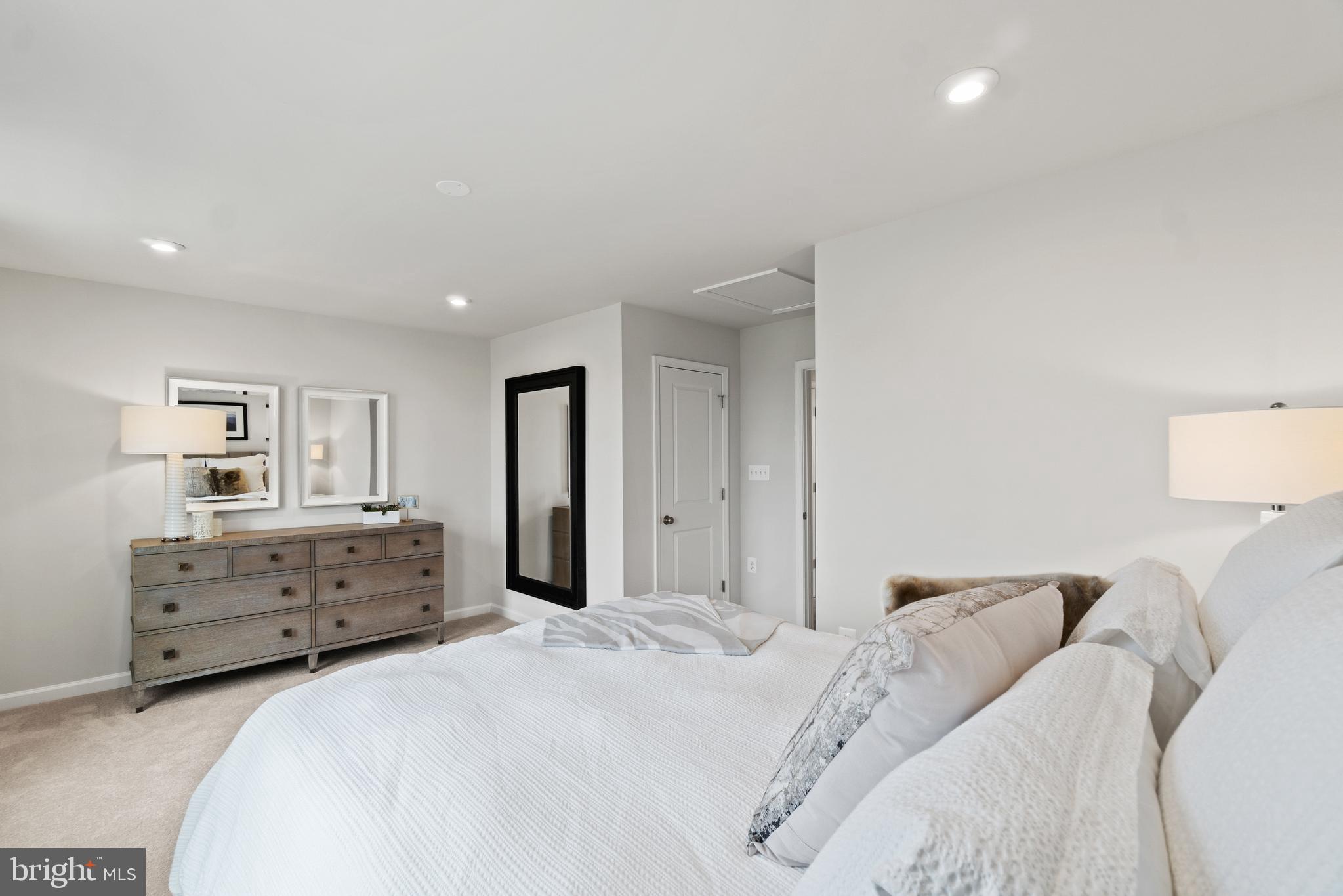 451 Presidents Pointe Avenue Ranson, WV 25438 - Photo 13 of 40 a bedroom with a bed and dresser