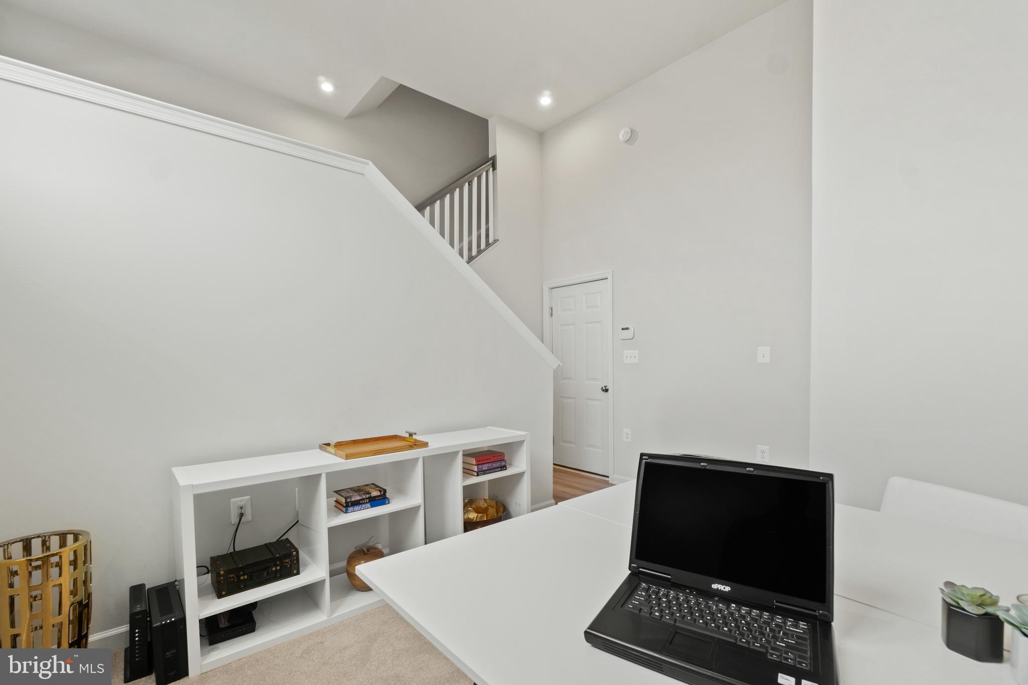 451 Presidents Pointe Avenue Ranson, WV 25438 - Photo 19 of 40 a view of livingroom with furniture and workspace