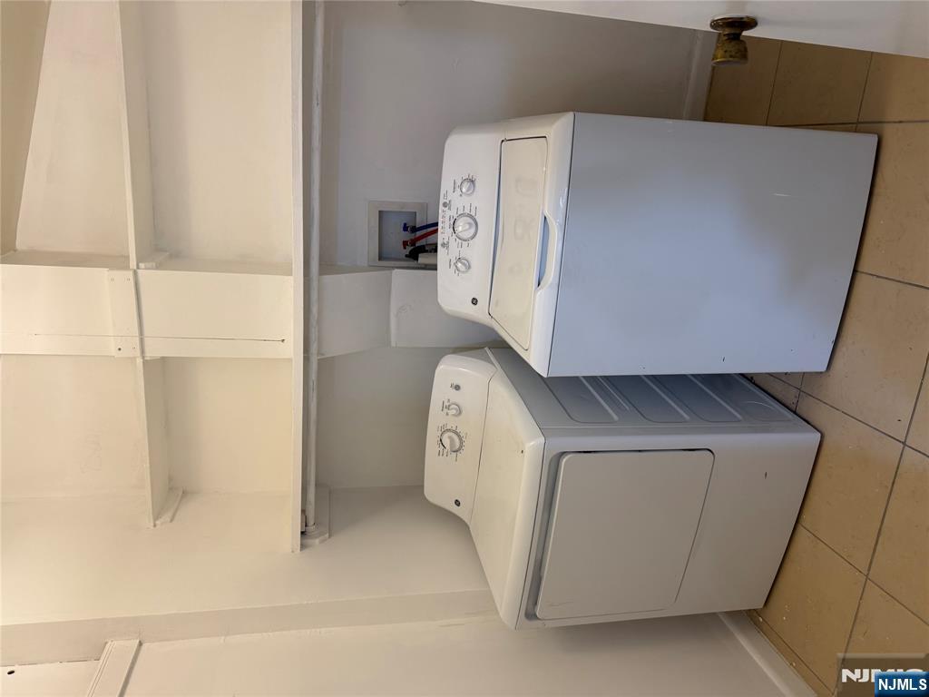 41 Wood Street, Unit 2 Rutherford, NJ 07070 - Photo 6 of 9 a utility room with dryer and washer