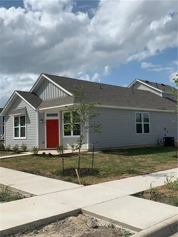 a front view of house with yard