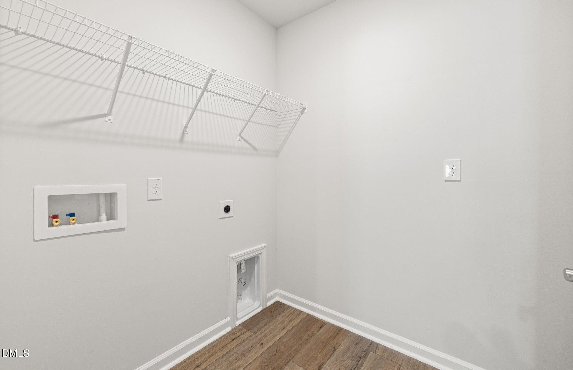 603 Timber Terrace Drive Durham, NC 27704 - Photo 15 of 17 a view of a room with wooden floor
