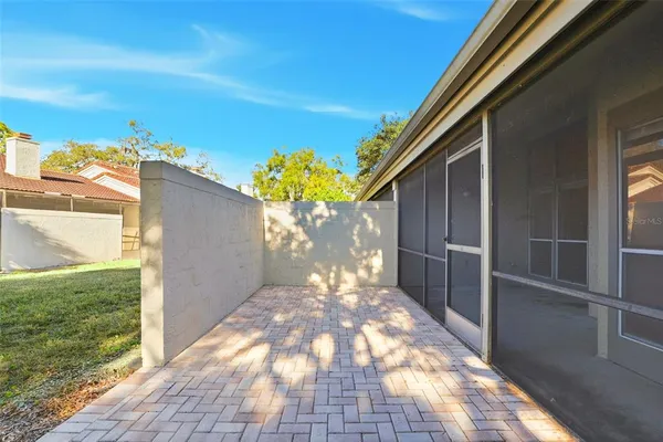 a view of a pathway with a yard