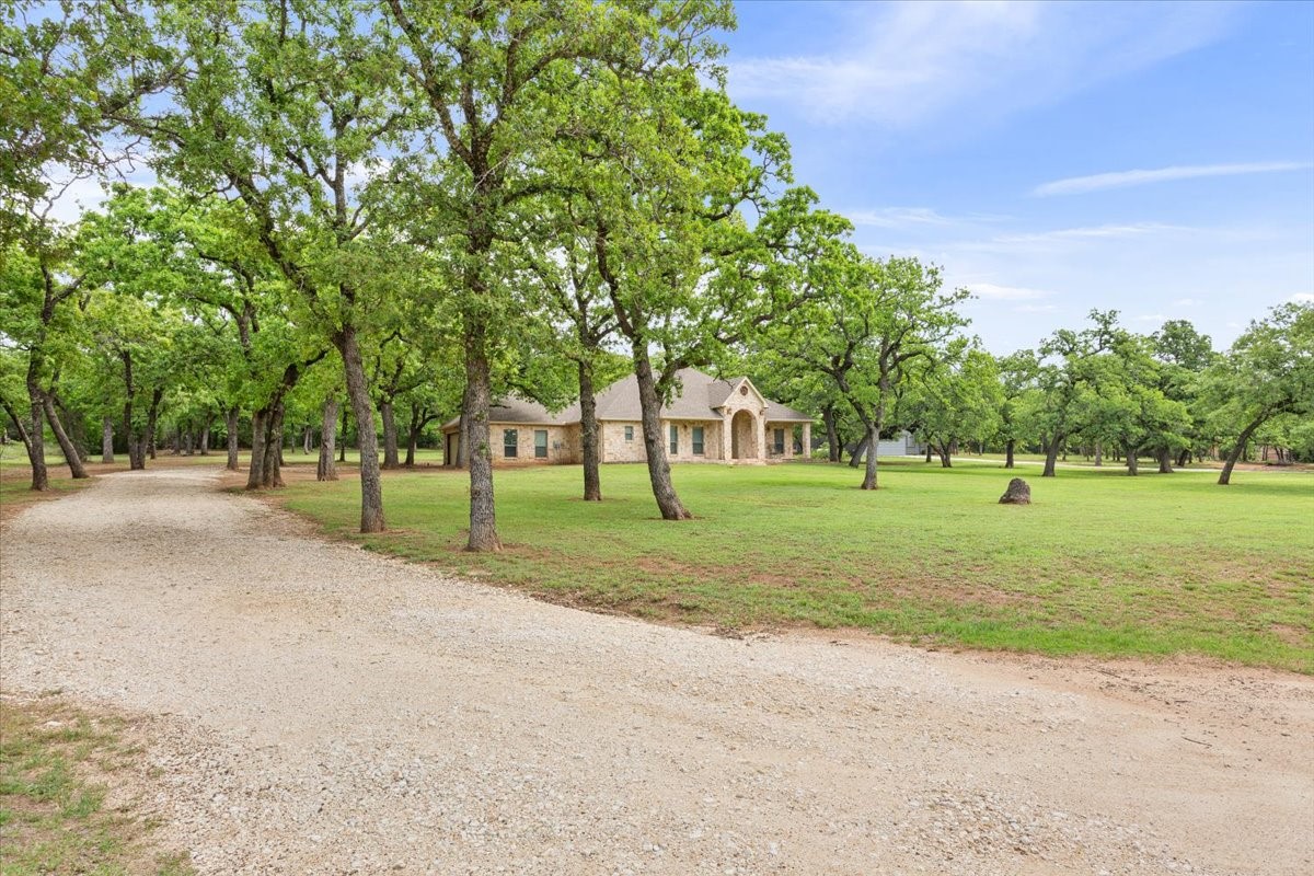 140 Oak Ridge Loop Whitney, TX 76692 - Photo 2 of 40 a view of a kids park