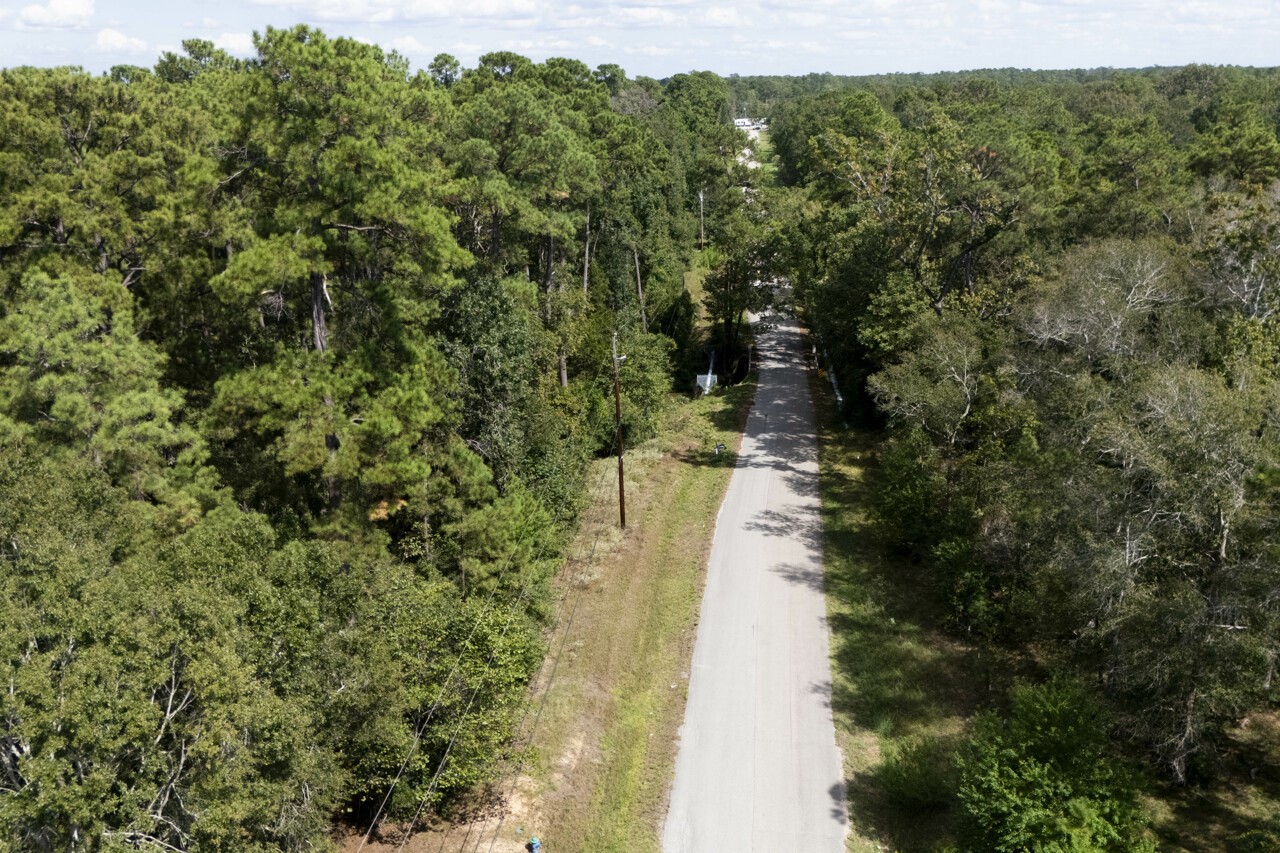 1135 Magnolia Point Drive Huffman, TX 77336 - Photo 6 of 8 a view of a house with a yard
