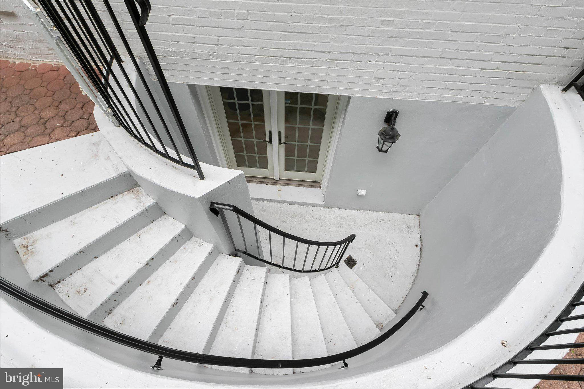 5193 Watson Street Northwest Washington, DC 20016 - Photo 40 of 45 Stairs to & from LL Family Room to Rear Yard