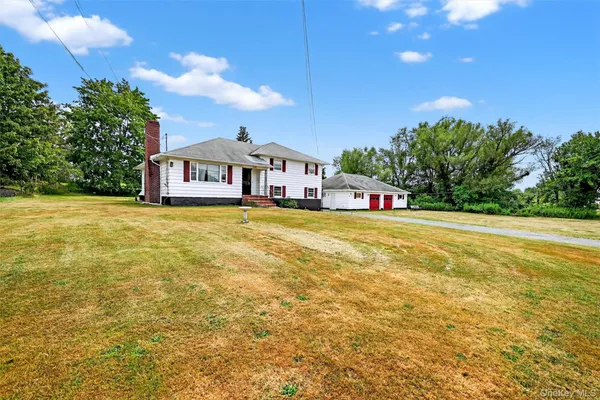 a view of a house with a swimming pool