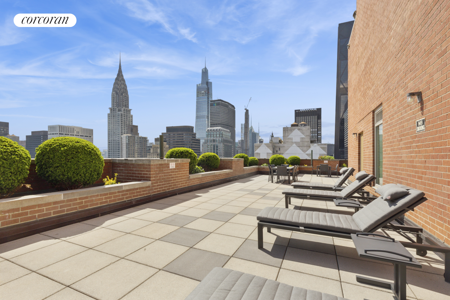 236 East 47th Street, Unit PH1A Manhattan, NY 10017 - Photo 8 of 9 a view of a terrace with chairs