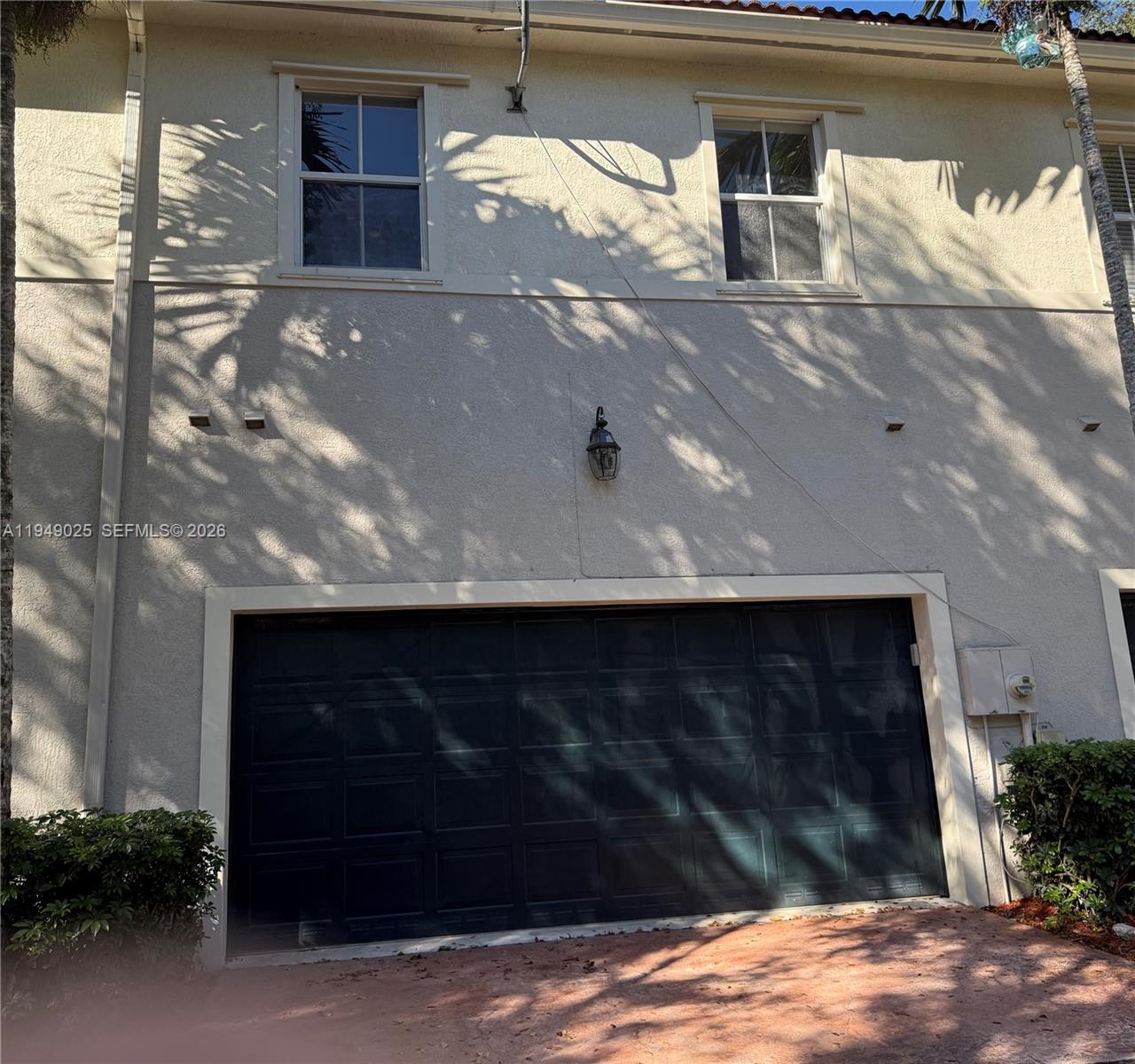 2511 Southwest 99th Way, Unit 2511 Miramar, FL 33025 - Photo 20 of 23 a view of backyard with seating space