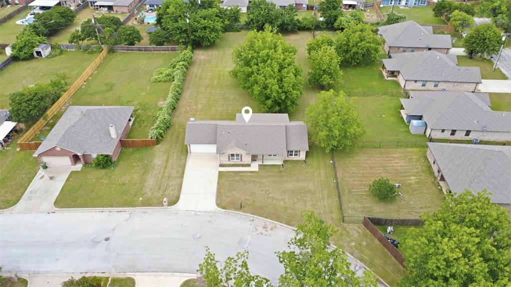 505 East 5th Street Springtown, TX 76082 - Photo 37 of 39 an aerial view of a house with outdoor space and a lake view
