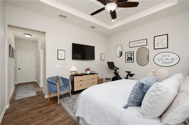a bathroom with a granite countertop sink mirror and shower