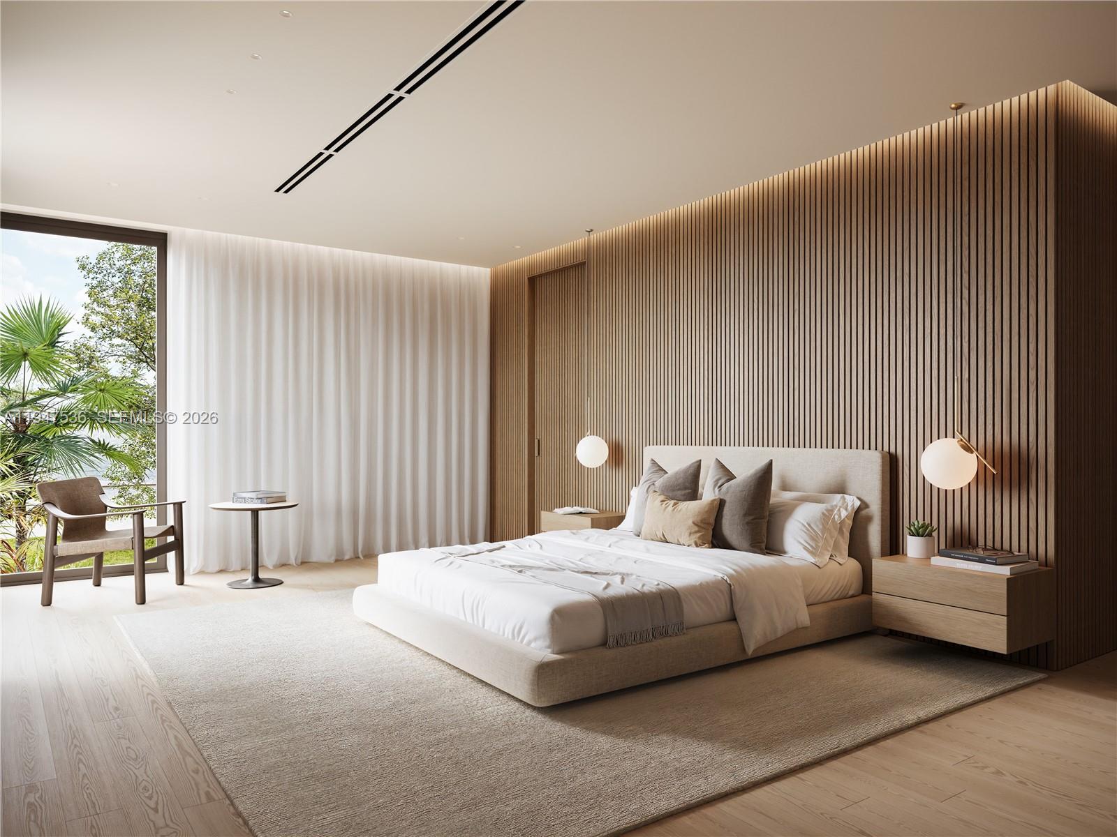 159 Northeast 99th Street Miami Shores, FL 33138 - Photo 9 of 12 a bedroom with a bed and a large window