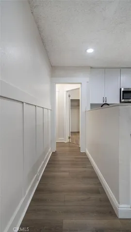 a view of kitchen with wooden floor