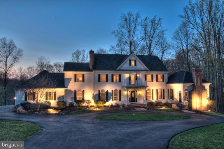 13925 Sunnybrook Road Phoenix, MD 21131 - Photo 2 of 30 a front view of a house with a yard