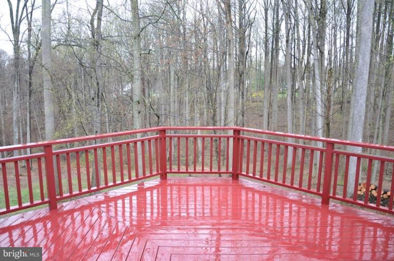 13925 Sunnybrook Road Phoenix, MD 21131 - Photo 27 of 30 a view of balcony with wooden floor