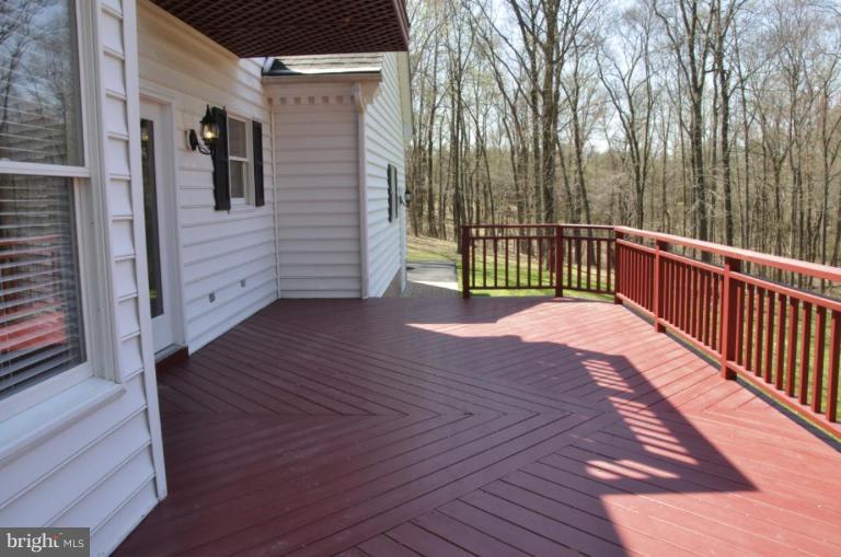 13925 Sunnybrook Road Phoenix, MD 21131 - Photo 8 of 30 a view of a balcony with wooden floor