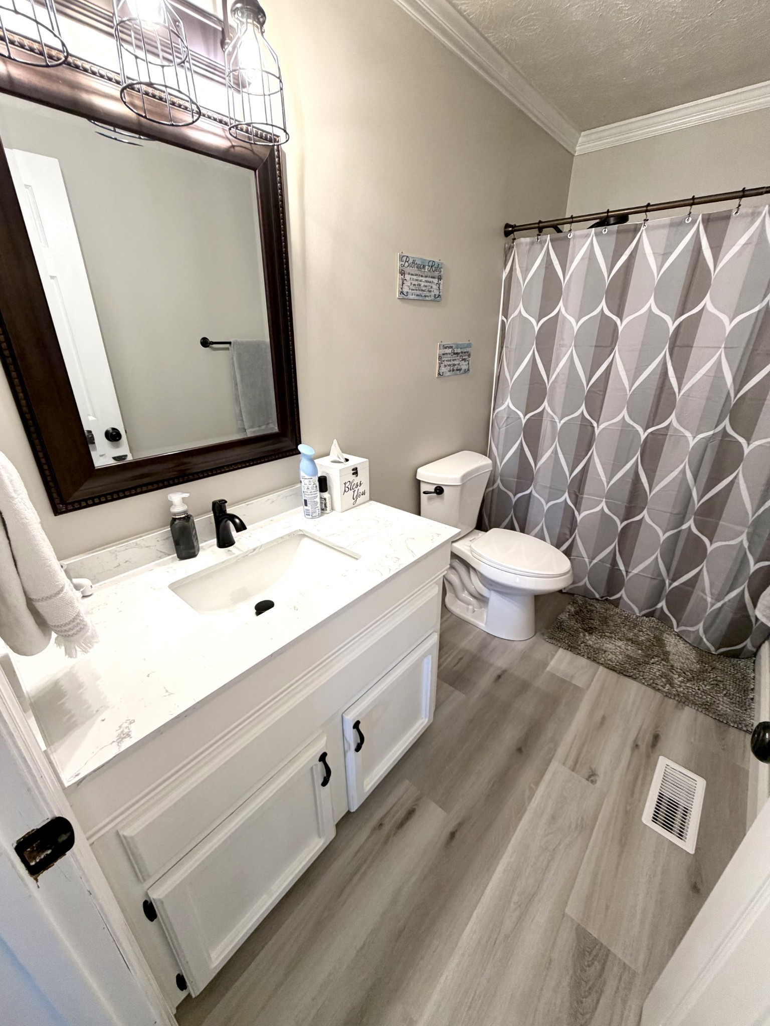 356 Lee Road Cottontown, TN 37048 - Photo 18 of 52 a bathroom with a sink and a mirror
