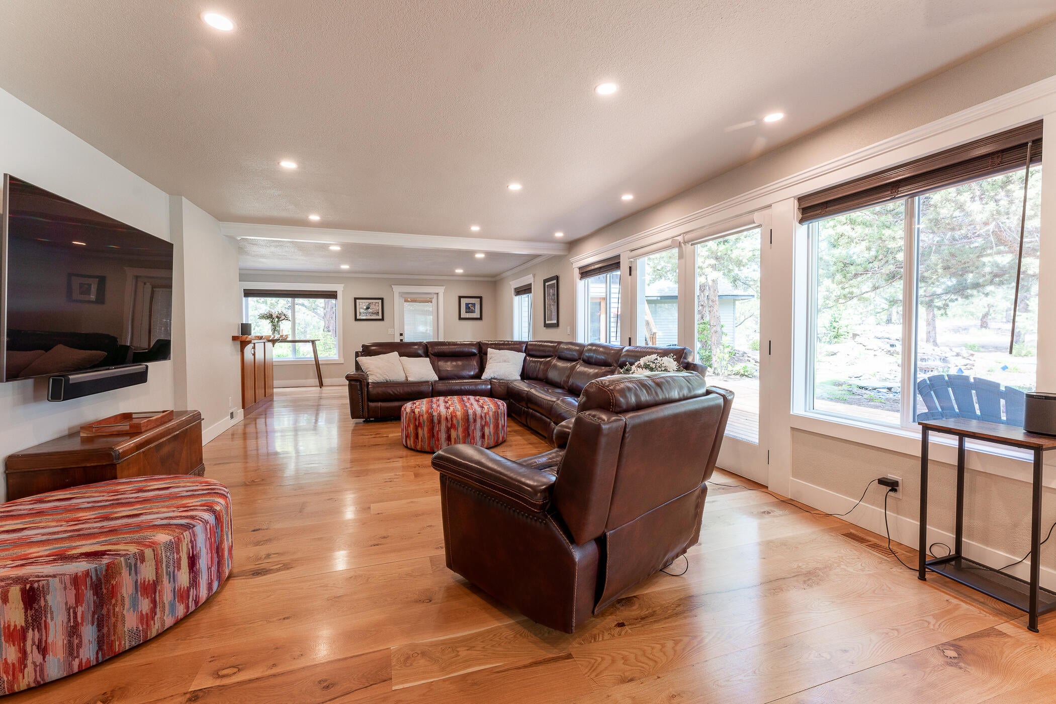 64300 Crosswinds Road Bend, OR 97703 - Photo 16 of 61 Views to the spacious living room adjacent to the kitchen provides a lovely opportunity to enjoy plenty of space for family and friends.