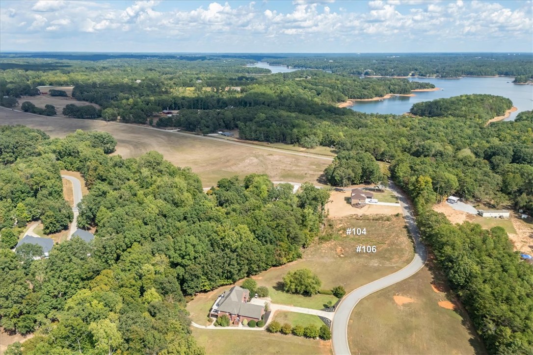 106 C-4-112A Anderson, SC 29625 - Photo 12 of 20 This elevated view captures the expansive natural beauty of the surrounding landscape and nearby lake.