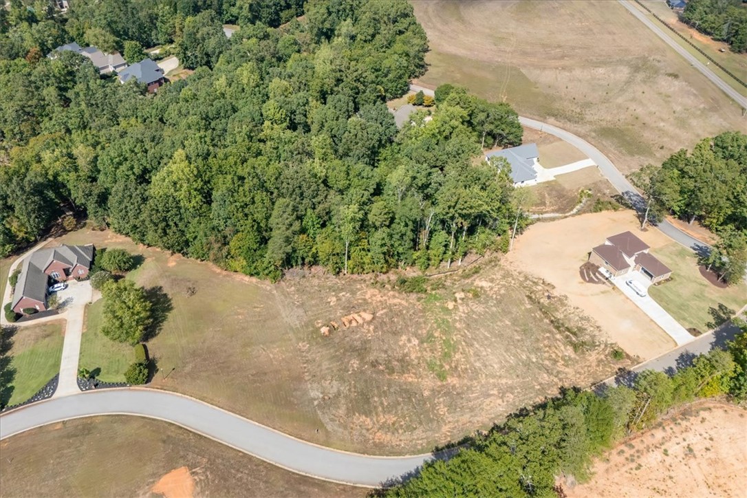 106 C-4-112A Anderson, SC 29625 - Photo 13 of 20 This expansive lot offers ample space for building your ideal home, surrounded by lush greenery and peaceful views.