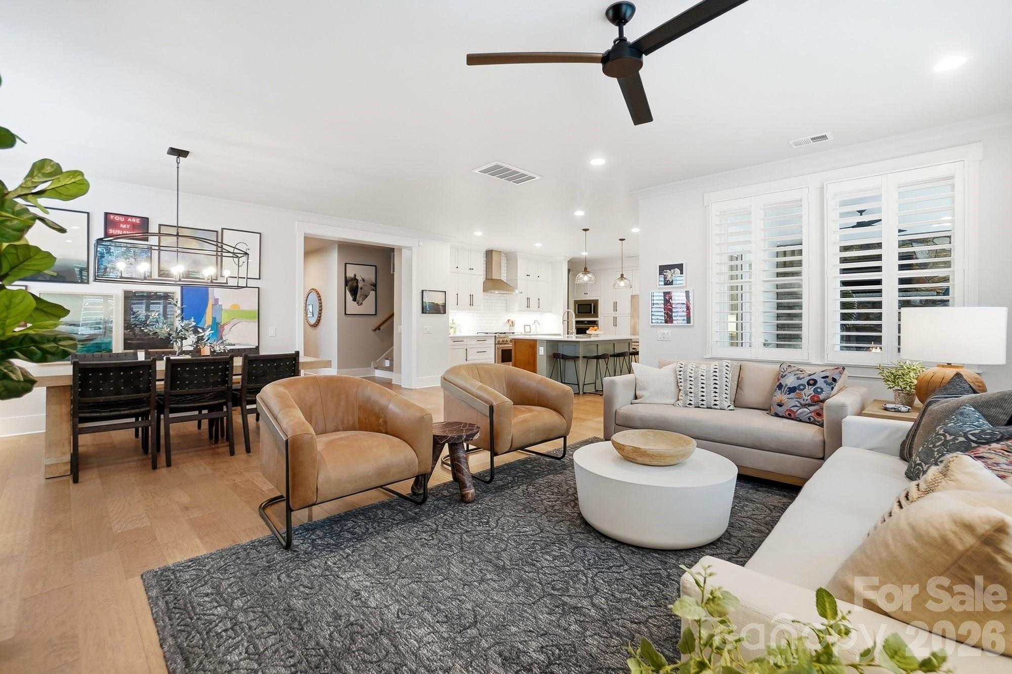 2052 Thatcher Way Fort Mill, SC 29715 - Photo 11 of 47 a living room with furniture and kitchen view