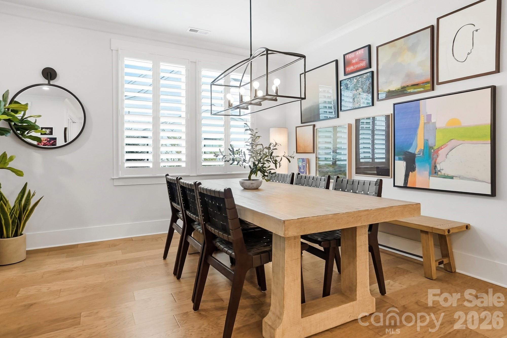 2052 Thatcher Way Fort Mill, SC 29715 - Photo 20 of 47 a view of a dining room with furniture window and wooden floor