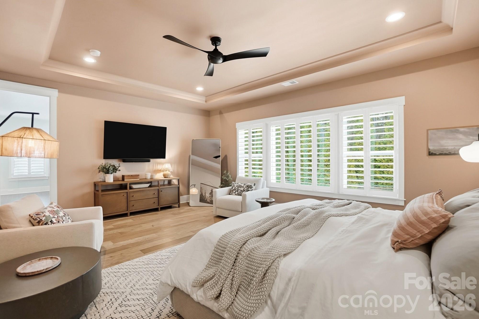 2052 Thatcher Way Fort Mill, SC 29715 - Photo 31 of 47 a bedroom with a bed a window and a flat screen television