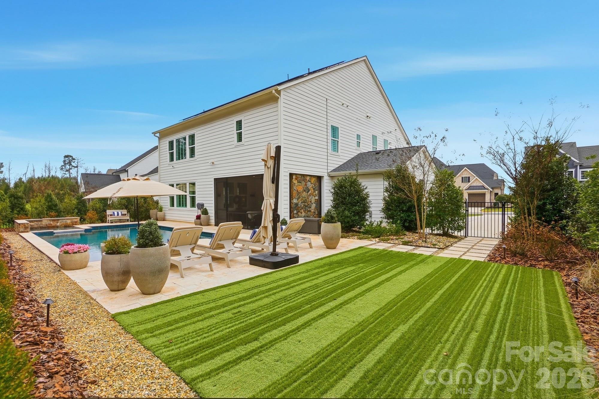 2052 Thatcher Way Fort Mill, SC 29715 - Photo 35 of 47 a view of a house with backyard and sitting area