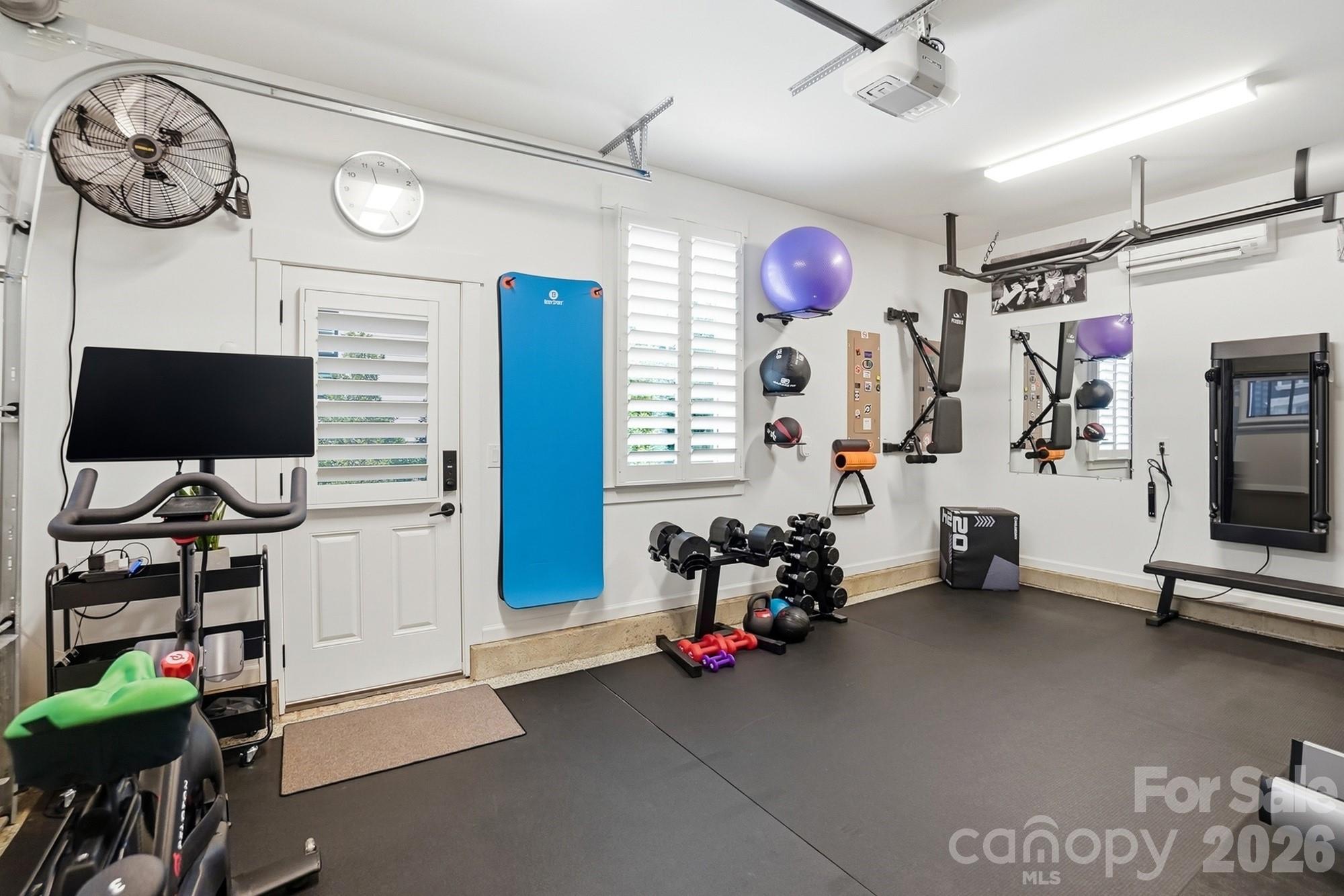 2052 Thatcher Way Fort Mill, SC 29715 - Photo 45 of 47 a view of a room with gym equipment