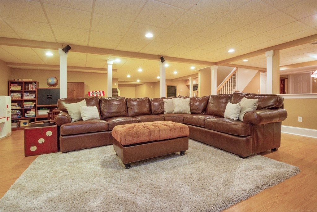 49 Amanda Road Sudbury, MA 01776 - Photo 23 of 30 a living room with furniture and a large window