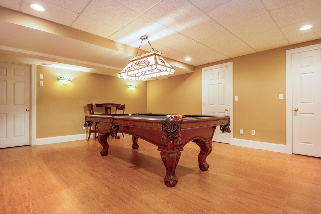 49 Amanda Road Sudbury, MA 01776 - Photo 24 of 30 a room with table soccer and chess table