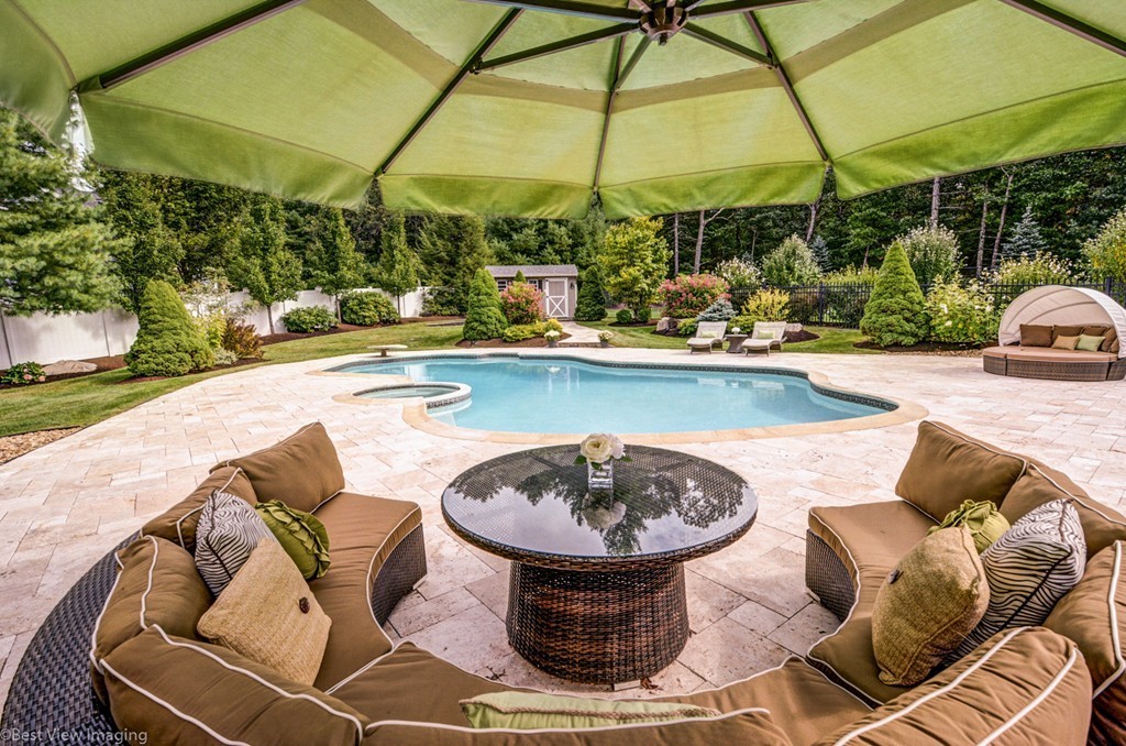 49 Amanda Road Sudbury, MA 01776 - Photo 25 of 30 a view of swimming pool with outdoor seating