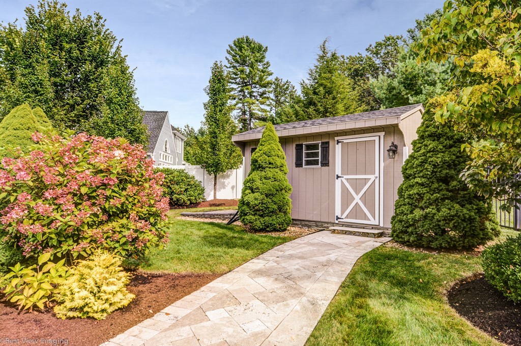 49 Amanda Road Sudbury, MA 01776 - Photo 28 of 30 a front view of a house with a yard