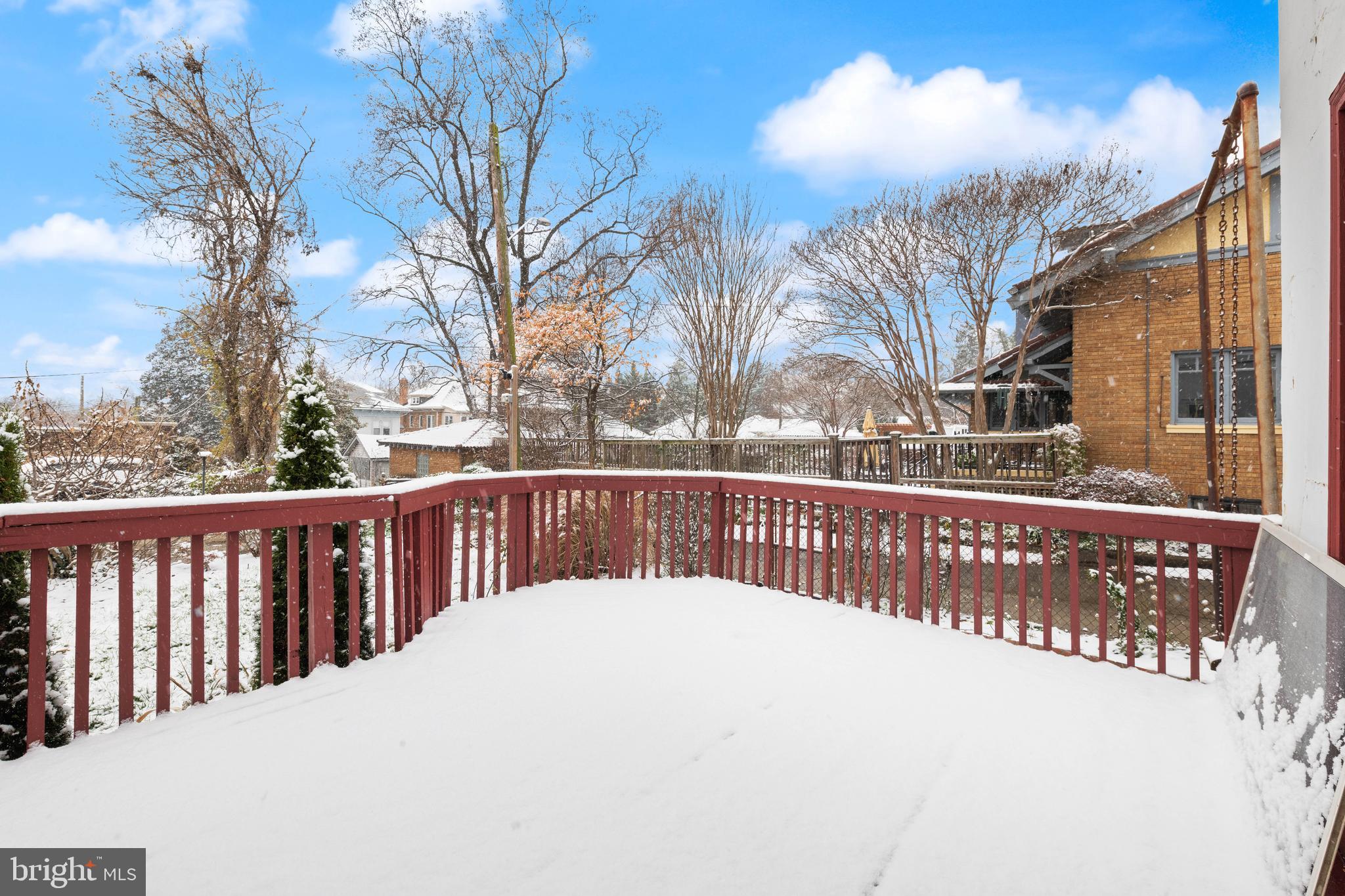 1702 Webster Street Northwest Washington, DC 20011 - Photo 17 of 42 a view of a wooden fence