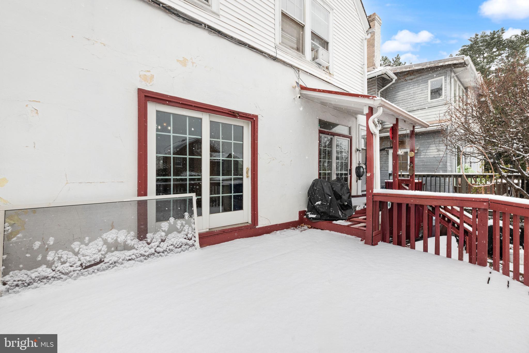 1702 Webster Street Northwest Washington, DC 20011 - Photo 18 of 42 a view of a house with a wooden fence