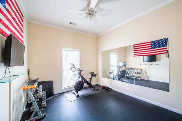a view of a room with gym equipment