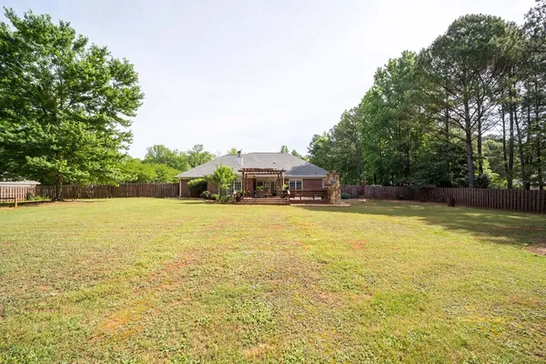 a view of a swimming pool with an outdoor space
