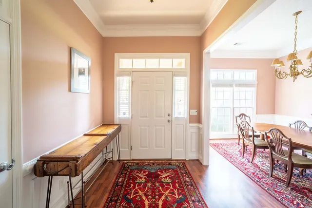 a room with furniture and wooden floor