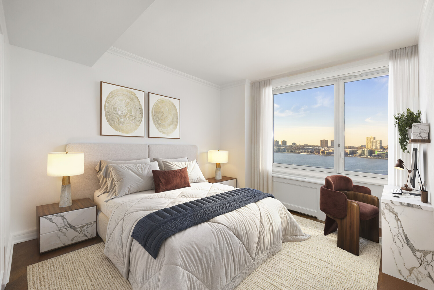 80 Riverside Boulevard, Unit 15B Manhattan, NY 10069 - Photo 14 of 26 a bedroom with a bed and wooden floor