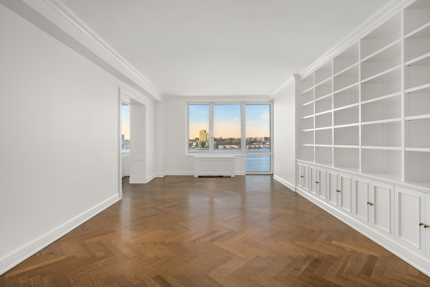 80 Riverside Boulevard, Unit 15B Manhattan, NY 10069 - Photo 4 of 26 a view of an empty room with a window