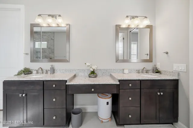 a bedroom with a bed and flat screen tv