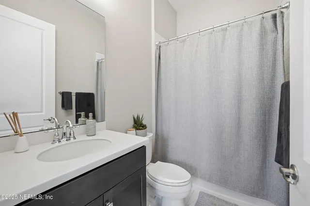 a view of a hallway with windows