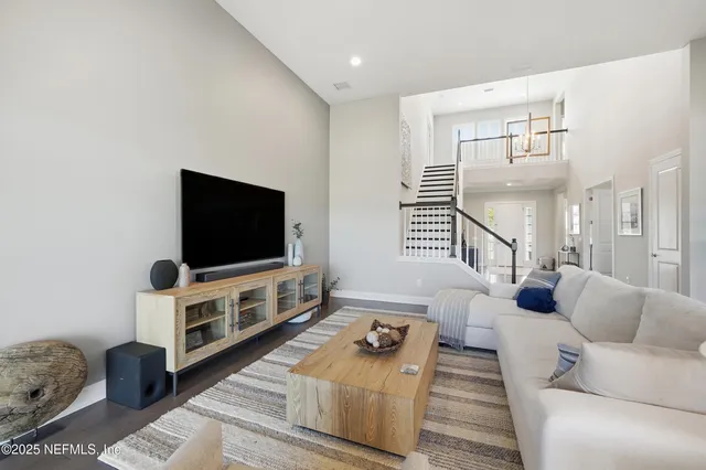 a kitchen with a table and chairs in it