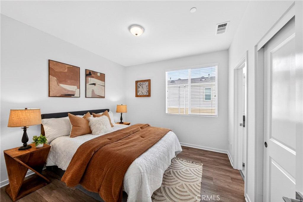156 North Orange Avenue Brea, CA 92821 - Photo 24 of 44 a bedroom with a bed and a window