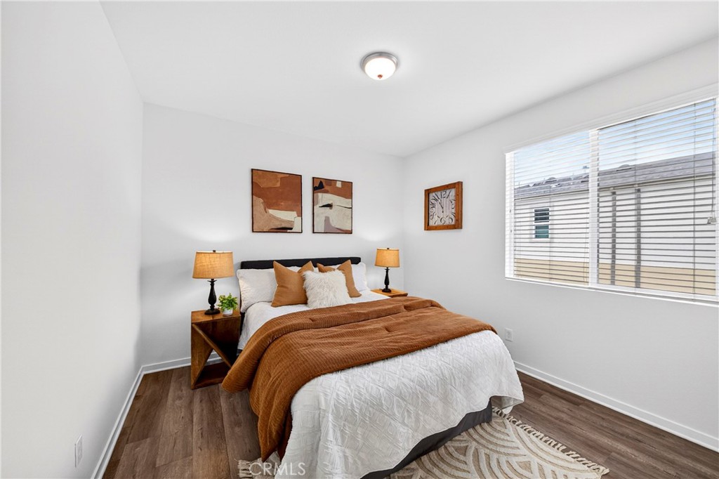 156 North Orange Avenue Brea, CA 92821 - Photo 26 of 44 a bed sitting in a bedroom next to a window