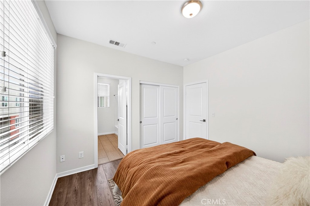 156 North Orange Avenue Brea, CA 92821 - Photo 28 of 44 a bedroom with a bed and a window