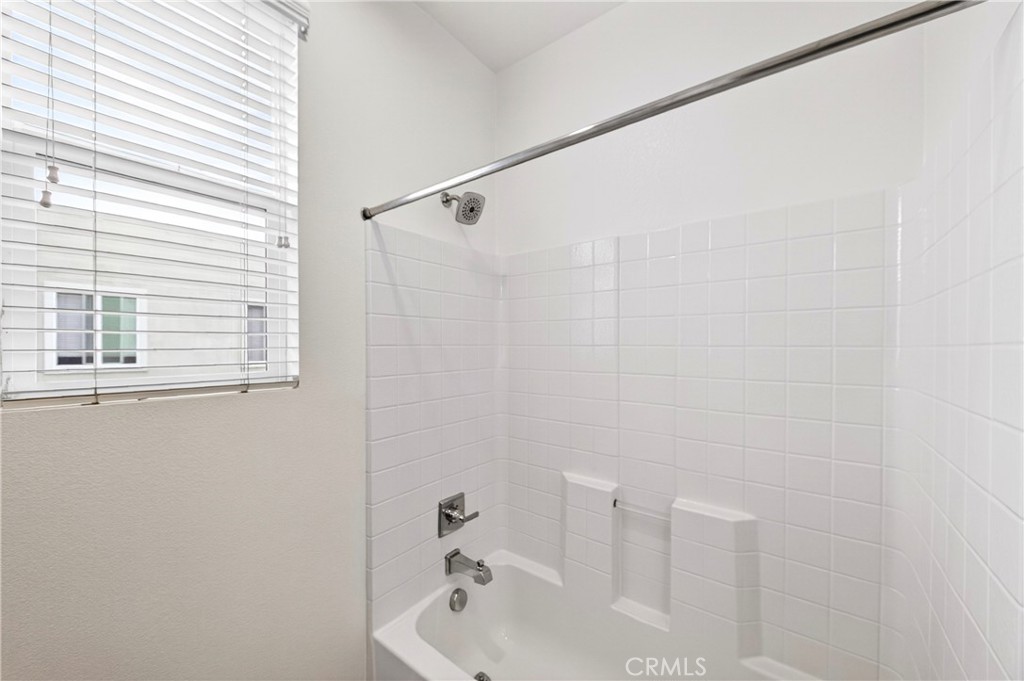 156 North Orange Avenue Brea, CA 92821 - Photo 31 of 44 a bathroom with a bathtub and shower