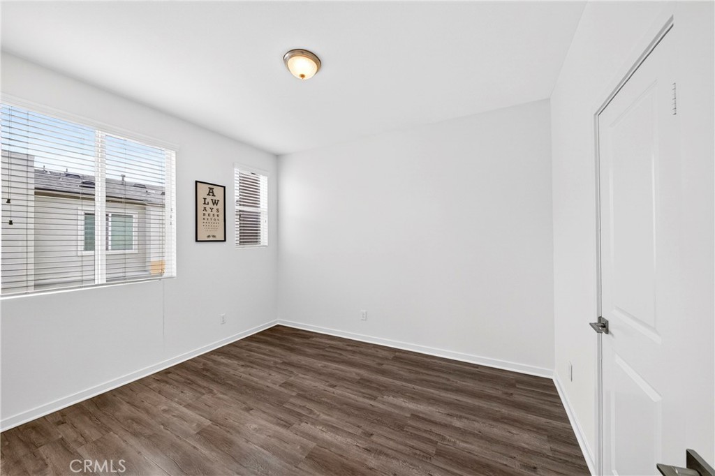 156 North Orange Avenue Brea, CA 92821 - Photo 32 of 44 a view of empty room with wooden floor and fan