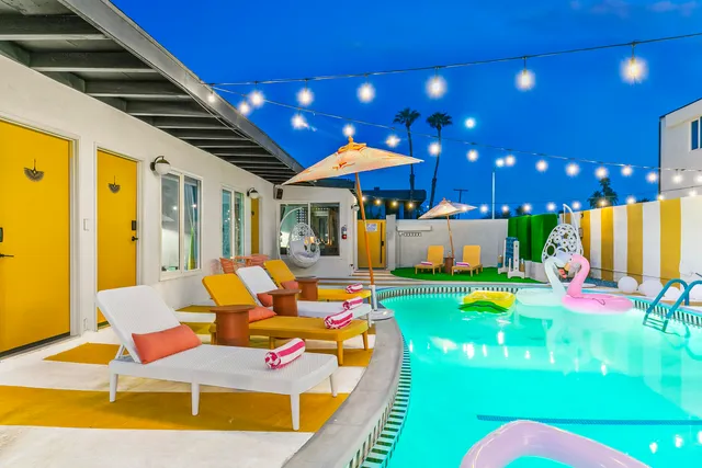 a view of a chairs and table on the wooden floor